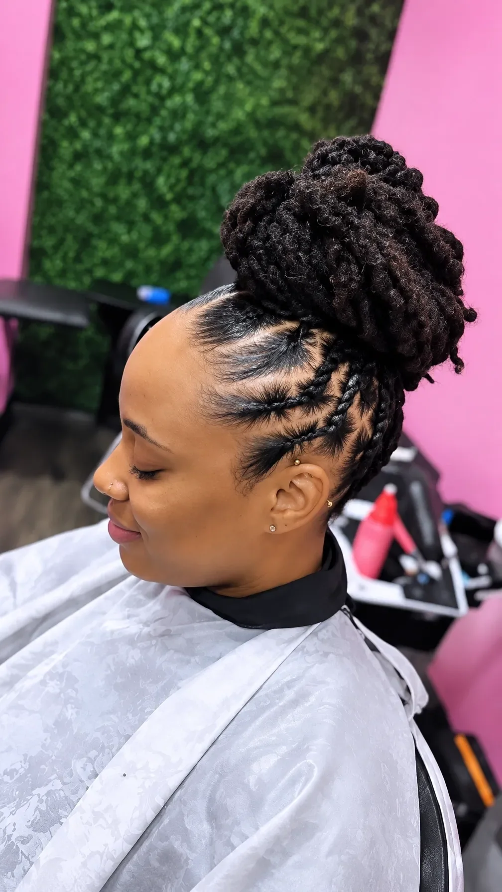 Finished braided bun with curved parting