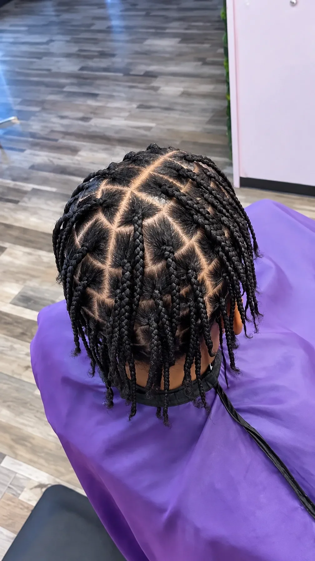 Finished short twists with a geometric parting pattern