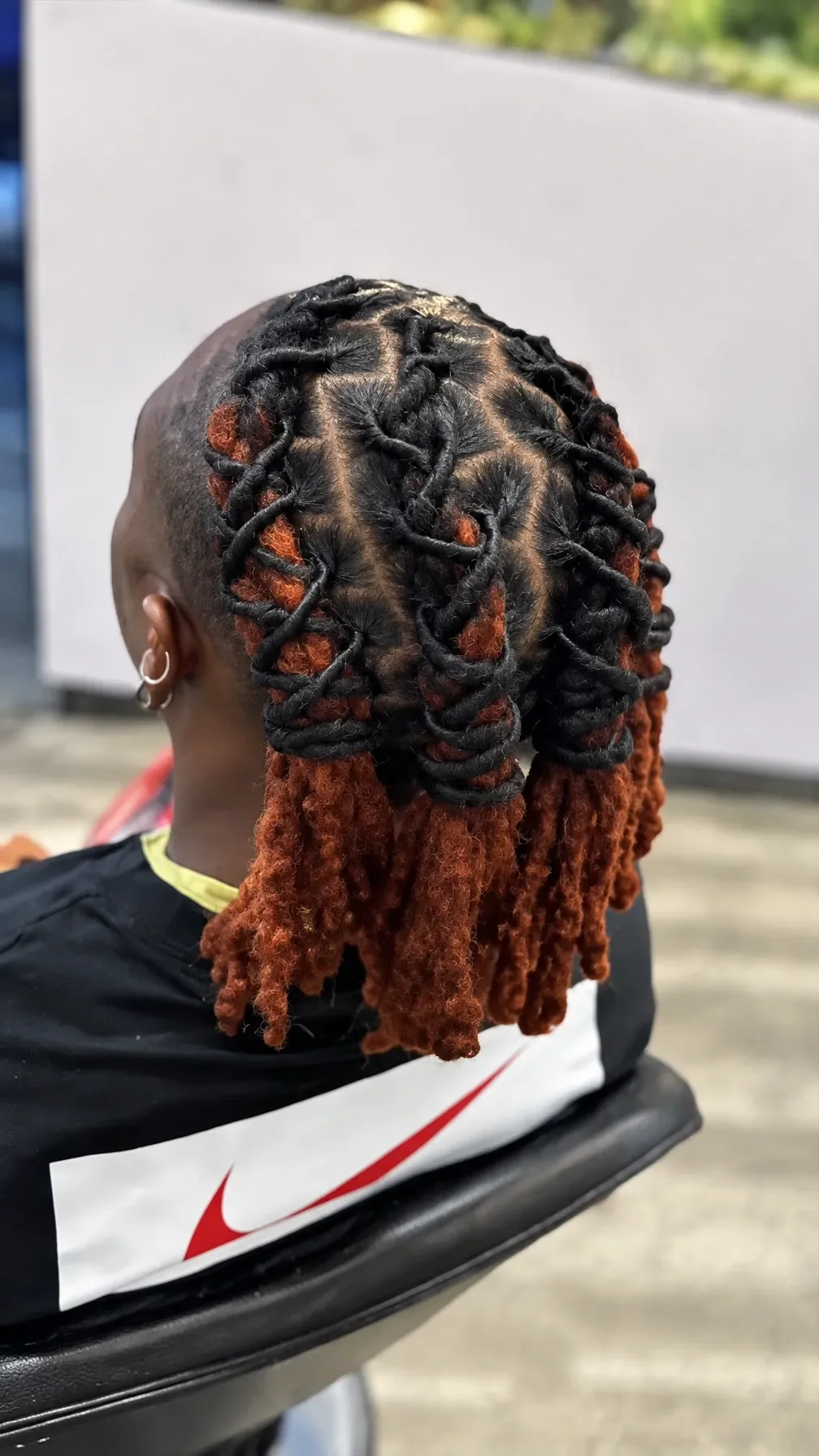 Finished braided style with warm red ends